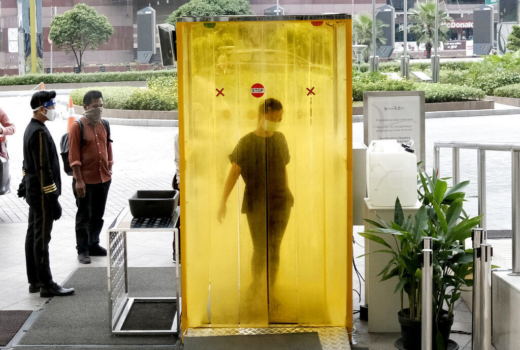 APTOPIX Virus Outbreak Indonesia